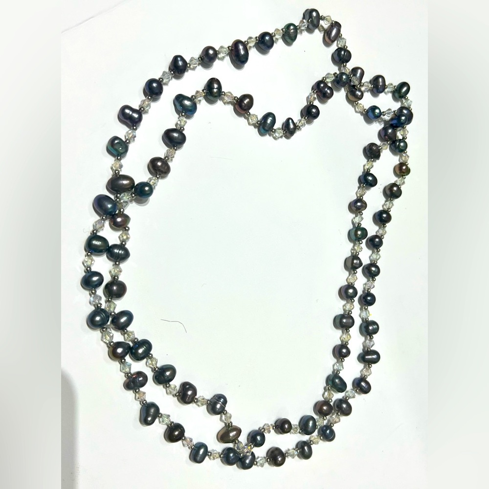 Real pearls with swarovski crystal beads.